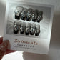 Black long coffin french tips with Aurora  liked Diamond