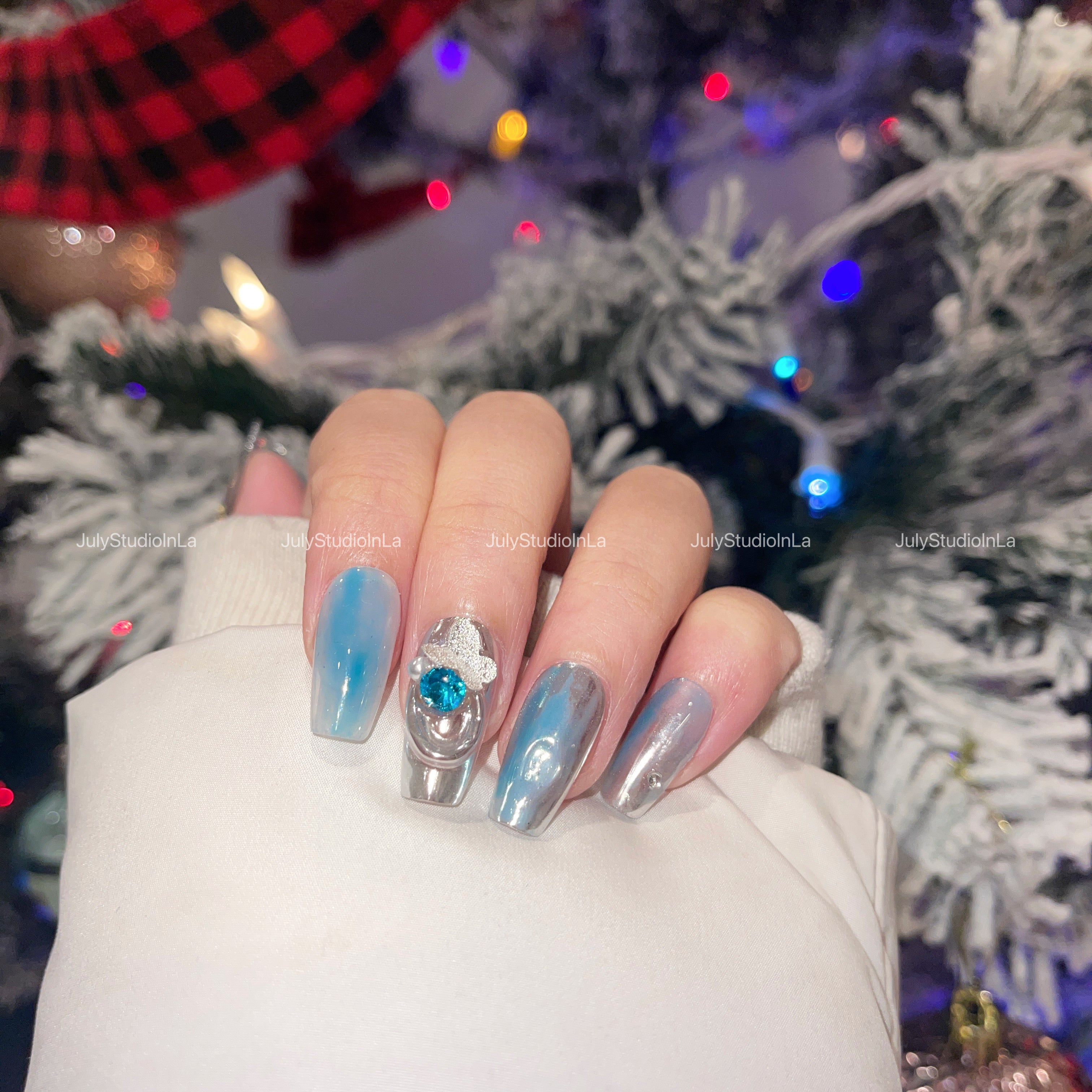 Love the shades of blue the nail tech did. This nail art design is hot with  rhinestone accents #nailart | Nails design with rhinestones, Pretty nails,  Nail art